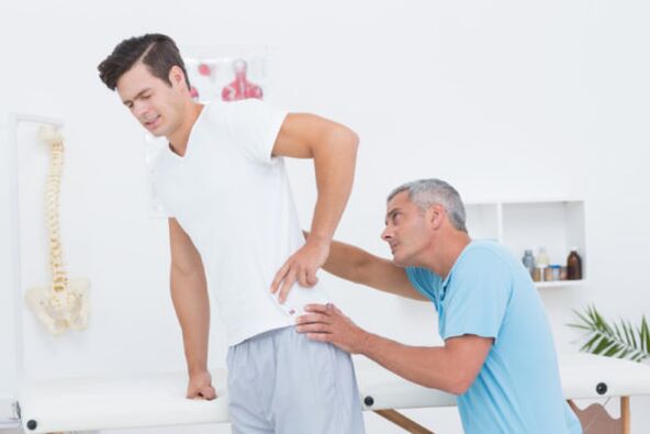 examination by a doctor for back pain
